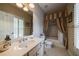 Bathroom featuring a single sink vanity, tile floors, and a tub-shower with curtains at 3127 Lenox Ne Rd # 1, Atlanta, GA 30324