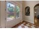 Beautiful entryway with leaded glass doors, marble floors and a decorative alcove at 3127 Lenox Ne Rd # 1, Atlanta, GA 30324