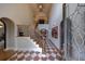 Grand foyer with high ceilings, a sweeping staircase, and elegant tile flooring at 3127 Lenox Ne Rd # 1, Atlanta, GA 30324
