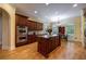 Gourmet kitchen with a center island, wooden cabinets, and stainless steel double wall oven at 3127 Lenox Ne Rd # 1, Atlanta, GA 30324