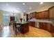 Gourmet kitchen with granite countertops, stainless steel appliances, and a breakfast bar area at 3127 Lenox Ne Rd # 1, Atlanta, GA 30324