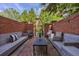 Inviting brick patio featuring comfortable seating, a charming brick surround, and a tranquil outdoor space at 3127 Lenox Ne Rd # 1, Atlanta, GA 30324