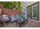 Inviting brick patio featuring comfortable seating, a charming brick surround, and a tranquil outdoor space at 3127 Lenox Ne Rd # 1, Atlanta, GA 30324