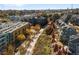 An aerial view showcases the community's townhomes and apartments in a vibrant, tree-lined neighborhood at 865 Ashland Ne Ave, Atlanta, GA 30307