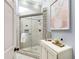 This bathroom features a tiled glass shower, a vanity, and tasteful decor at 865 Ashland Ne Ave, Atlanta, GA 30307
