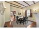 Dining room with exposed beam ceiling and hardwood floors at 865 Ashland Ne Ave, Atlanta, GA 30307
