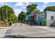 Exterior view of a building with colorful mural art, offering a visually appealing and unique community spot at 865 Ashland Ne Ave, Atlanta, GA 30307