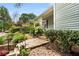 Beautiful walkway and lush landscaping lead to the quaint, covered front porch at 865 Ashland Ne Ave, Atlanta, GA 30307