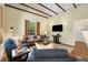 Spacious living room with exposed beams, hardwood floors, and a cozy atmosphere at 865 Ashland Ne Ave, Atlanta, GA 30307