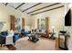 Comfortable living room featuring exposed beams and a neutral color palette at 865 Ashland Ne Ave, Atlanta, GA 30307