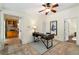 Office space featuring a ceiling fan, desk, and views into another room at 865 Ashland Ne Ave, Atlanta, GA 30307