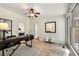 Bright home office with ceiling fan, a modern desk, and tiled floors at 865 Ashland Ne Ave, Atlanta, GA 30307