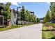 Scenic view of a tree-lined walking path next to modern apartments at 865 Ashland Ne Ave, Atlanta, GA 30307
