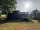 Home's exterior view with deck and yard is perfect for enjoying outdoor living at 1231 Providence Way, Lawrenceville, GA 30046