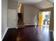 Inviting entryway with hardwood floors and staircase to upper level at 1231 Providence Way, Lawrenceville, GA 30046