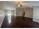 Spacious living room with hardwood floors, with a sliding glass door at 1231 Providence Way, Lawrenceville, GA 30046