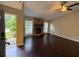 Bright living room with hardwood floors and a stone fireplace at 1231 Providence Way, Lawrenceville, GA 30046