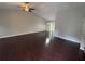 Spacious living room with hardwood floors and bright natural light at 1231 Providence Way, Lawrenceville, GA 30046