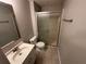 This bathroom features a shower and a vanity with granite countertop at 2036 Countydown Ln, Stone Mountain, GA 30088