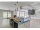 Gourmet kitchen featuring a large island, stainless steel appliances, and plenty of natural light at 37 Deer Canyon Dr, Auburn, GA 30011