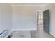 Living room showcasing wood-look flooring, an open doorway and ample space at 37 Deer Canyon Dr, Auburn, GA 30011