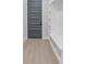 Mudroom area with built-in shelves, bench, and coat hooks at 37 Deer Canyon Dr, Auburn, GA 30011