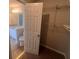 This is an image of a partial bathroom and closet, the bathroom features granite countertop at 5769 Shadow Creek Dr, Lithonia, GA 30058