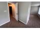 Bedroom featuring neutral walls and carpet and a white door leading to another room at 5769 Shadow Creek Dr, Lithonia, GA 30058