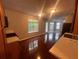 Kitchen area with hardwood flooring, window view, and stainless steel appliances at 5769 Shadow Creek Dr, Lithonia, GA 30058