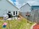 Backyard featuring a grill, patio, seating and fenced perimeter at 24 Samuel Nw Way, Cartersville, GA 30121