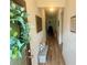 Charming hallway with wooden floors, decorative accents, and a cozy bench under framed art at 24 Samuel Nw Way, Cartersville, GA 30121