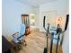 Bright office with neutral walls, wood floors, workout space, and view to an adjacent room at 24 Samuel Nw Way, Cartersville, GA 30121
