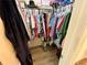 Walk-in closet providing ample storage with shelves, rods and hardwood floors at 24 Samuel Nw Way, Cartersville, GA 30121
