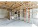 Unfinished basement area with wood framing, concrete floor, and windows for natural light at 3390 Mill Valley Dr, Dacula, GA 30019