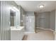 Bathroom featuring a vanity with chrome fixtures, and a shower stall at 3390 Mill Valley Dr, Dacula, GA 30019