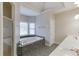 Bright bathroom featuring a large soaking tub, separate shower, double vanity and elegant fixtures at 3390 Mill Valley Dr, Dacula, GA 30019