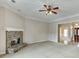 Living room with stone fireplace and view to entryway at 3390 Mill Valley Dr, Dacula, GA 30019
