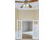 Spacious living room with ceiling fan and doors leading to another room at 3390 Mill Valley Dr, Dacula, GA 30019