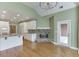 This open-concept living room features a fireplace and access to a porch at 3390 Mill Valley Dr, Dacula, GA 30019