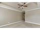 Spacious main bedroom with tray ceiling and door at 3390 Mill Valley Dr, Dacula, GA 30019