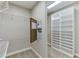 Organized walk-in closet with shelving and storage space, offering ample room for clothing and accessories at 3390 Mill Valley Dr, Dacula, GA 30019