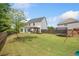 Expansive backyard with gazebo, trampoline, and swing set offers ample space for recreation at 461 Timberleaf Rd, Canton, GA 30115