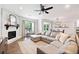 Bright and airy living room with a fireplace and access to a sunroom at 461 Timberleaf Rd, Canton, GA 30115