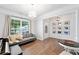 Inviting living room with a piano, sofa, and charming decor at 461 Timberleaf Rd, Canton, GA 30115