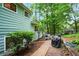 Exterior shows a patio, grill, and landscaped yard at 495 Ramsdale Dr, Roswell, GA 30075