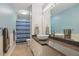 Modern bathroom with stylish vessel sink and blue-striped shower curtain at 495 Ramsdale Dr, Roswell, GA 30075