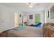 Comfortable bedroom with a door to bathroom and walk-in closet at 495 Ramsdale Dr, Roswell, GA 30075