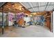 Spacious garage offers potential for customization with existing art at 495 Ramsdale Dr, Roswell, GA 30075