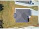 Aerial view shows a house with a new roof and lawn at 51 Deer Canyon Dr, Auburn, GA 30011