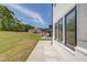 Enjoy outdoor living with a patio and scenic backyard in this home's backyard at 51 Deer Canyon Dr, Auburn, GA 30011